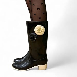 Chanel camellia rain boots